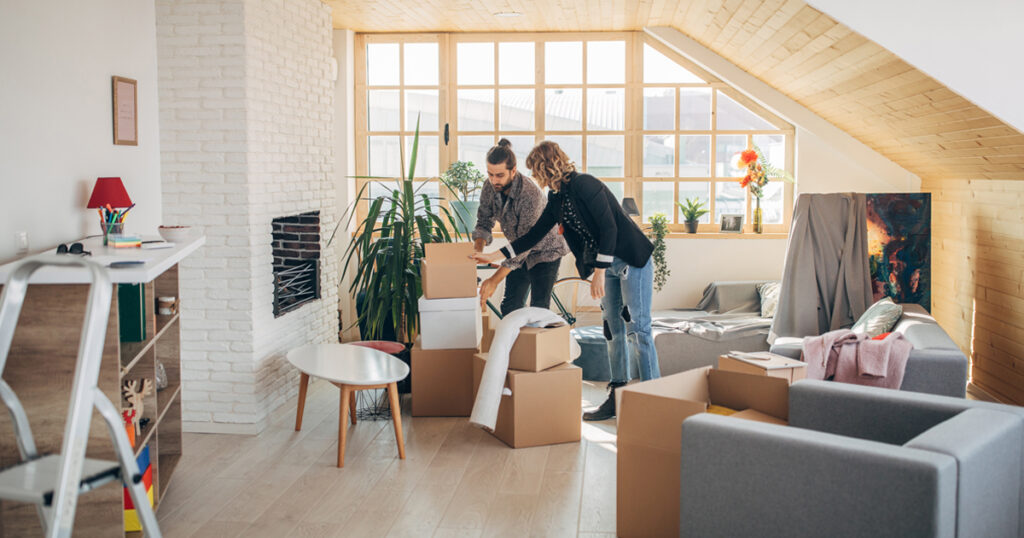 Young couple moving into an apartment