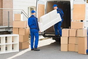 Moving crew loading a moving truck.
