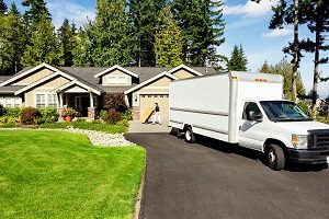 Moving truck outside a home