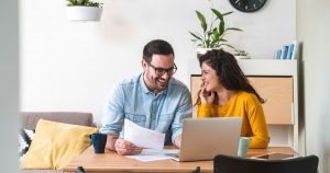 Man and woman looking at finances
