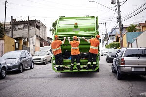 Junk removal crew and dump truck