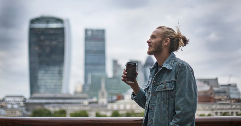 Man in a cloudy city
